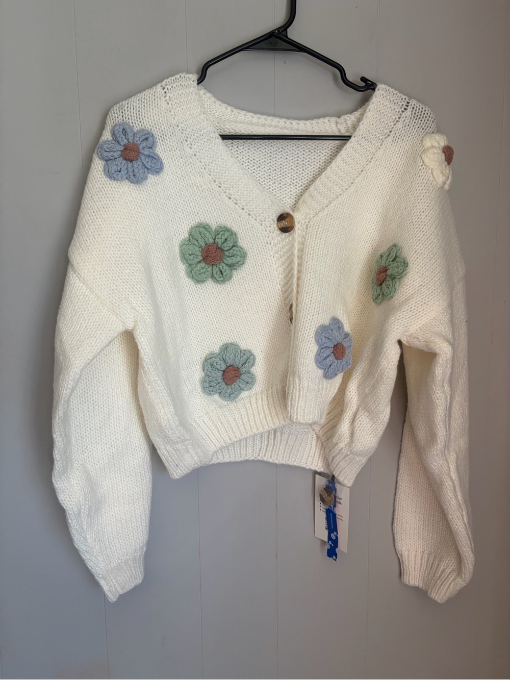 Cider Cream V-Neck Knit Cardigan with Pastel Floral Appliqués